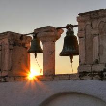 Photo: Church bells at sunset, © Magdalena Bujak / Shutterstock.com