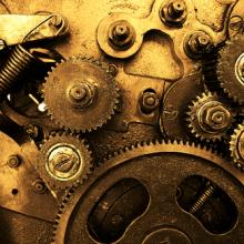Photo: Clock gears, © Vitaly Korovin/ Shutterstock.com