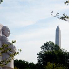 A memorial to Dr. Martin Luther King, Jr gazes towards the Washington Monument i