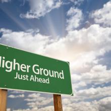 Higher ground sign, Andy Dean Photography / Shutterstock.com