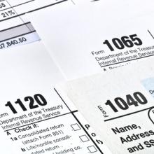 Photo: Tax forms,  © Garry L. / Shutterstock.com