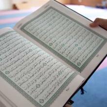 A Quran photographed in a mosque (2012). RNS photo by Sally Morrow 