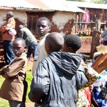 Tom Gowon, 9, in a brown jacket, with his fellow refugees at Baga Sola camp, Cha