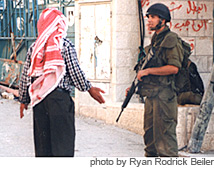 090416-palestinian-and-israeli-soldier