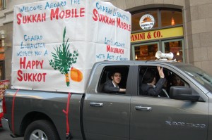 Lubavitchers and their Sukkot Mobile parked across from Zuccotti Park. Photo by Cathleen Falsani/Sojourners