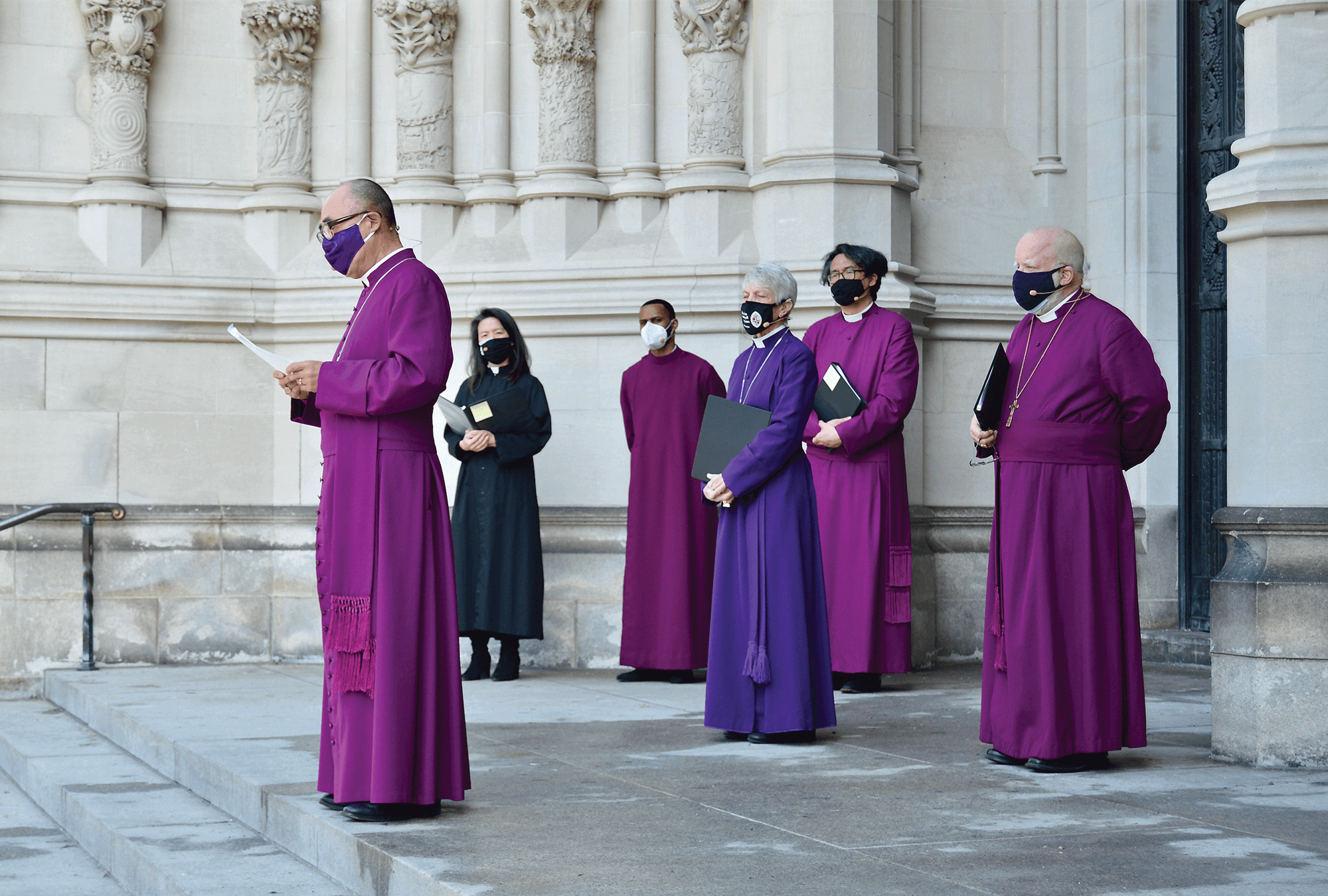 Rt. Rev. Allen K. Shin outside New York's Cathedral of St. John the Divine / Cathedral archives Photo of a gathering of Episcopal leaders outside St. John the Divine Cathedral.