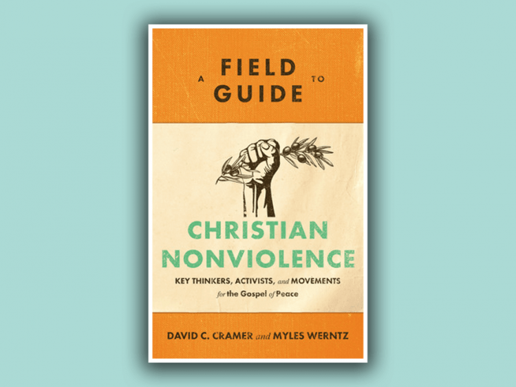The cover of "A Field Guide to Christian Nonviolence" features a clenched hand holding an olive branch.