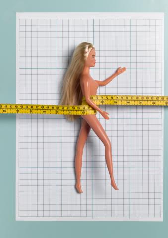 Child's doll with tape measure, Peter Dazeley / Getty Images Child's doll with tape measure, Peter Dazeley / Getty Images
