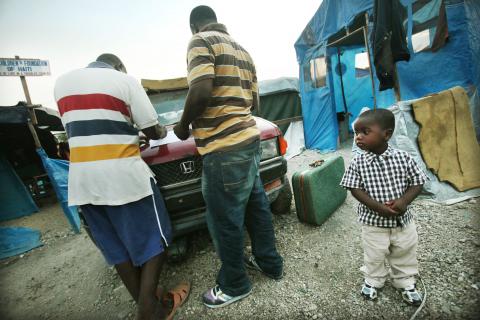 Orphan Beaudin Lovinsky, 4-years-old, is placed into the Children's Foundation of Haiti orphanage. Mario Tama/Getty Images Mario Tama/Getty Images