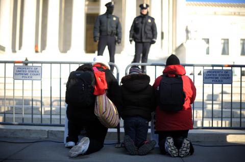 Protestor pray in front of the Supreme Court during the 2011 March for Life. TIM SLOAN/AFP/Getty Images TIM SLOAN/AFP/Getty Images