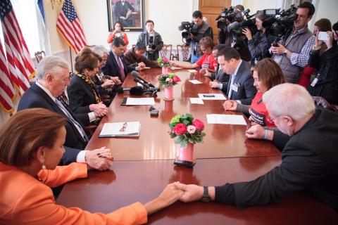 Fast4Families fasters pray with House Minority Leader Nancy Pelosi and Senate Majority Leader Harry Reid. Courtesy Fast4Families Courtesy Fast4Families
