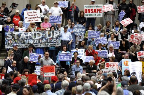 Protestors gather to oppose requiring insurance coverage for contraception. TIMOTHY A. CLARY/AFP/Getty Images TIMOTHY A. CLARY/AFP/Getty Images