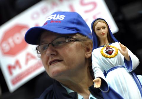Catholic demonstrator in NYC protests the HHS rule on contraception, March 23, 2012. Photo by Timothy A. Clary/AFP/Getty Images.