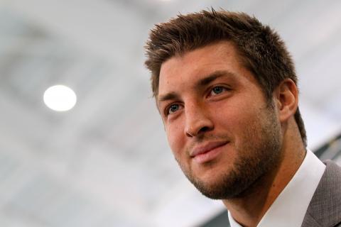 Tim Tebow addresses the media as he is introduced as a New York Jet March 26. Photo by Mike Stobe/Getty Images Photo by Mike Stobe/Getty Images