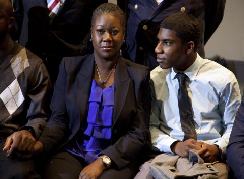 Trayvon's mother and brother watch Corey announce charges vs Zimmerman. Photo by Evan Vucci-Pool/Getty Images Photo by Evan Vucci-Pool/Getty Images
