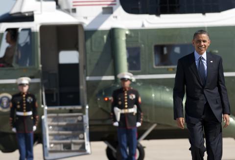 President Barack Obama disembarks from Marine One, en route to Cartegena, Colombia. Saul Loeb/AFP/Getty Images Saul Loeb/AFP/Getty Images