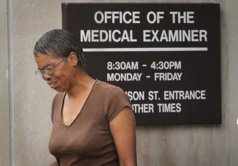 Dolores Walker leaves the Cook County ME's office after identifying her slain 16-year-old son. Scott Olson/Getty Images Scott Olson/Getty Images