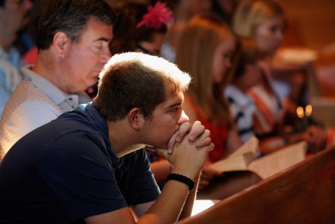 Parishioners in Aurora, CO pray during morning mass remembering victims of the theater shooting. Kevork Djansezian/Getty Images Kevork Djansezian/Getty Images