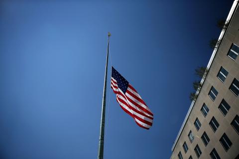 An American flag flies at half staff outside the State Department September 12. Alex Wong/Getty Images Alex Wong/Getty Images