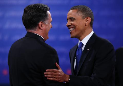 President Barack Obama (R) shakes hands with Mitt Romney after the debate. Mark Wilson/Getty Images Mark Wilson/Getty Images