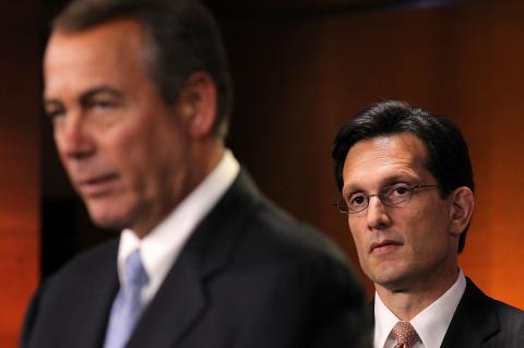 Rep. John Boehner (R-OH) (L) speaks as Rep. Eric Cantor (R-VA) (R) looks on. Alex Wong/Getty Images Alex Wong/Getty Images