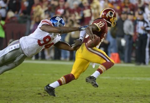 Redskins QB RGIII outruns N.Y. Giants linebacker Mathias Kiwanuka. Jonathan Newton / The Washington Post via Getty Images Jonathan Newton / The Washington Post via Getty Images