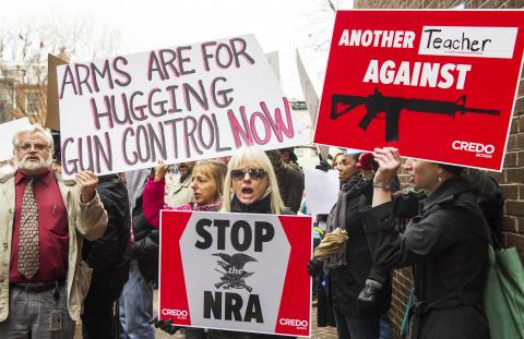 Protesters marching with the social activist group CREDO for stronger gun laws. PAUL J. RICHARDS/AFP/Getty Images PAUL J. RICHARDS/AFP/Getty Images