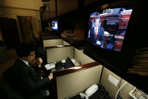 Sen. Rand Paul (R-Ky.) is seen on a TV monitor participating in a filibuster. Alex Wong/Getty Images Alex Wong/Getty Images