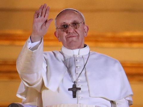 Newly elected Pope Francis waves to the St. Peter's Square crowd. Peter Macdiarmid/Getty Images Peter Macdiarmid/Getty Images