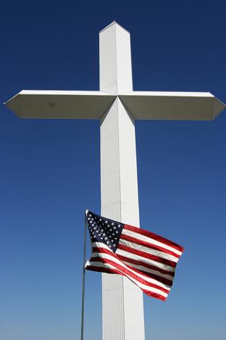 Cross and Flag. Image via Wylio http://bit.ly/rU6OGA Cross and Flag. Image via Wylio http://bit.ly/rU6OGA