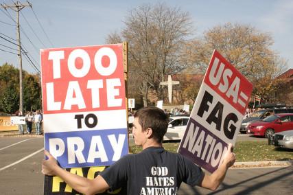 Westboro Baptist Church members protest at a Presbyterian church in Madison, Wis. Photo courtesy cometstarmoon via Flickr Photo courtesy cometstarmoon via Flickr