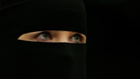 A woman wearing a niqab veil listens during a seminar. Photo by Scott Barbour/Getty Images Photo by Scott Barbour/Getty Images