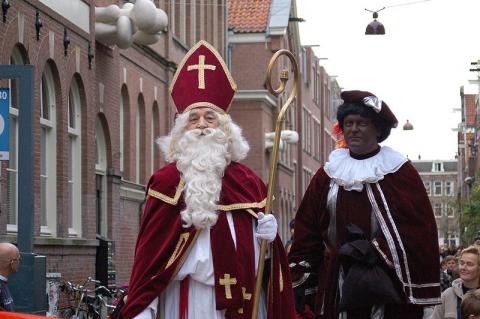 Sinterklaas and Zwarte Piet (aka "Black Pete") in a holiday parade in Holland, 2006. Photo via http://bit.ly/4rt3nE Sinterklaas and Zwarte Piet (aka "Black Pete") in a holiday parade in Holland, 2