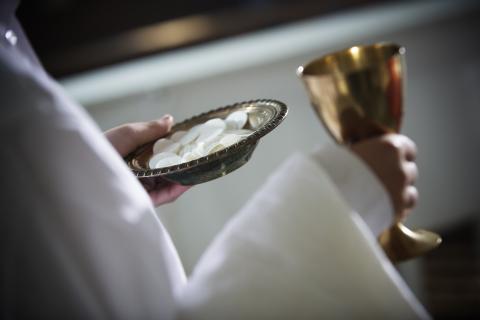 Close up of communion wafers and chalice, Ron Koeberer / Getty Images Close up of communion wafers and chalice, Ron Koeberer / Getty Images