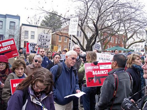 Protestors gather outside the NRA's Washington, D.C. office on Dec. 17, 2012. Photo by majunznk / Flickr Photo by majunznk / Flickr