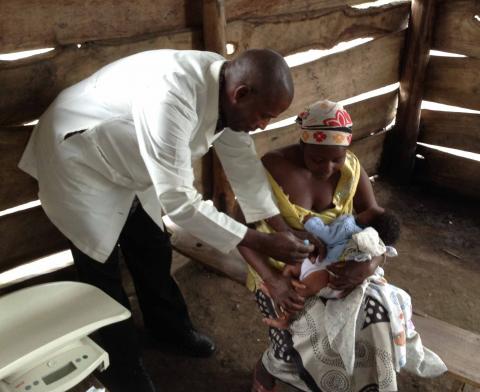 Health worker vaccinates baby at Bishop Masereka Medical Center in Uganda. Photo:Christian Connections for International Health