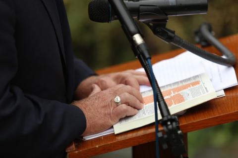 JIm Wallis reads from the Poverty and Justice Bible. Photo by Brandon Hook / Sojourners Photo by Brandon Hook / Sojourners