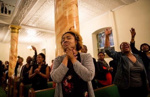 Mourners In Harlem Hold Prayer Service And Vigil For Victims Of Charleston Church Shooting, by Eric Thayer / Getty Images
