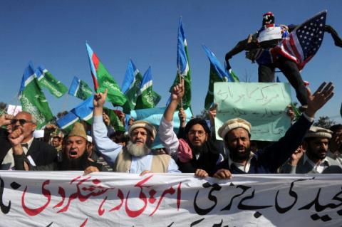 Pakistani activists protest burning of Quran at Kandahar Air Base. By A. MAJEED/AFP/Getty Images A. MAJEED/AFP/Getty Images