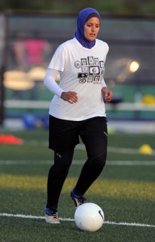 Australian-Egyptian soccer player Assmaah Helal wears a hijab, during a training session. TORSTEN BLACKWOOD/AFP/Getty Images TORSTEN BLACKWOOD/AFP/Getty Images