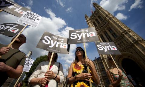 Demonstrators protest against potential British military involvement in Syria in London Thursday. ANDREW COWIE/AFP/Getty Image ANDREW COWIE/AFP/Getty Image