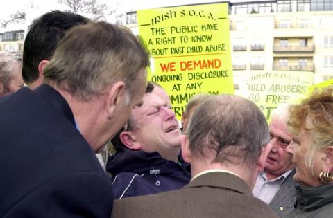 Clergy abuse protest in Dublin, 2002. Photo via Getty Images. Clergy abuse protest in Dublin, 2002. Photo via Getty Images.