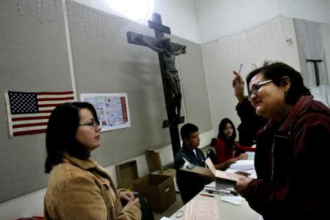 Voting station in a California Catholic church, 2008. Photo by Sandy Huffaker/Getty Images. Photo by Sandy Huffaker/Getty Images.