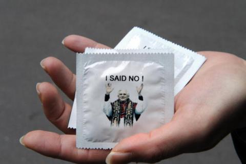 A woman shows condoms with a picture of Pope Benedict XVI, "I said No!" By BORIS HORVAT/AFP/Getty Images BORIS HORVAT/AFP/Getty Images