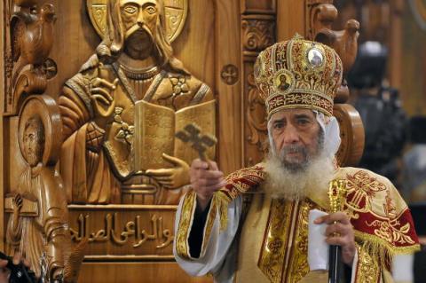 Pope Shenuda III leads Christmas midnight mass, 2010. Photo by AMR AHMAD/AFP/Getty Images Pope Shenuda III leads Christmas midnight mass, 2010. (AMR AHMAD/AFP/Getty Image