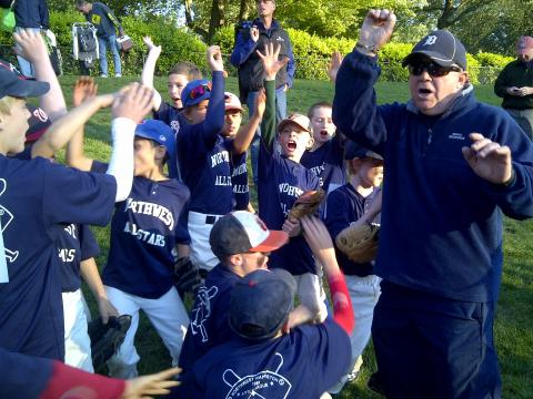 Jim Wallis with the Tigers Little League team. Photo courtesy Jim Wallis Jim Wallis with the Tigers Little League team. Photo courtesy Jim Wallis