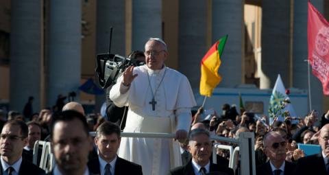 Pope Francis waves from the pope-mobile during his inauguration Mass. RNS photo by Andrea Sabbadini RNS photo by Andrea Sabbadini