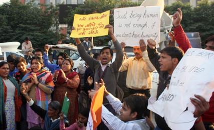 Protesters seek justice for a gang rape victim, outside Sufdarjung Hospital in 2012. Creative Commons image by Ramesh Lalwani.
