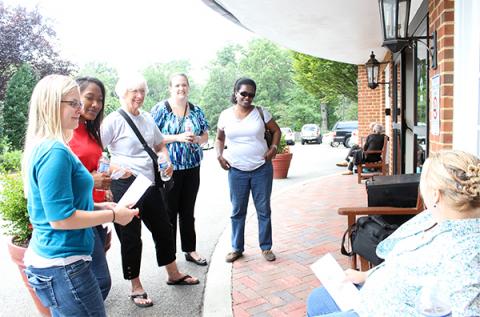 Lay evangelists review their visit to a Washington, D.C.-area nursing home. RNS photo by Adelle M. Banks RNS photo by Adelle M. Banks