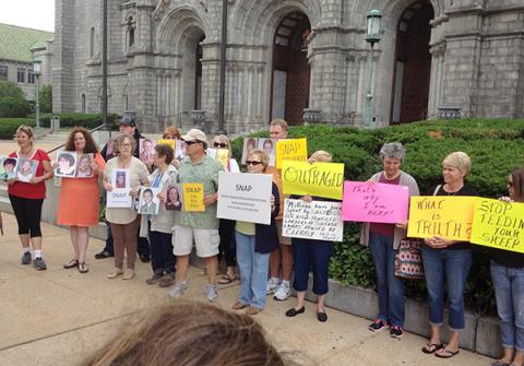 Protesters in front of the Cathedral Basilica of Saint Louis on June 11, 2014. Photo courtesy Barb Dorris, via SNAP.